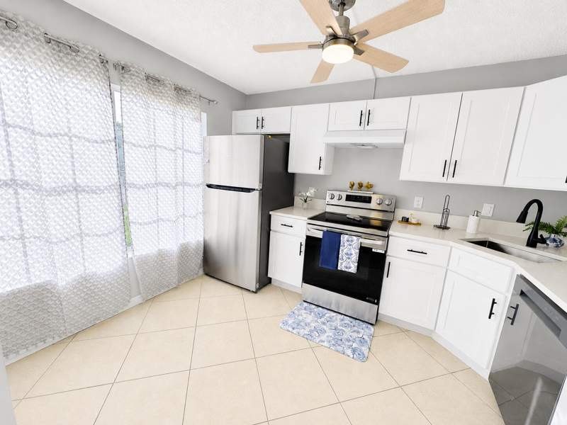 3 bedroom Townhouse at 222 Foxtail Drive #E, Charter Club Of Palm Beach, Greenacres — photo 2