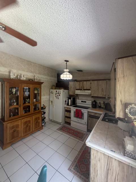 1304 Donwoods Lane, Royal Palm Beach FL - photo 8 of 39