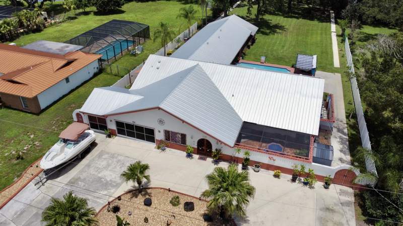 5 bedroom Single Family Residence at 457 S Naranja Avenue, River Park-Unit 4, Port St. Lucie — photo 3