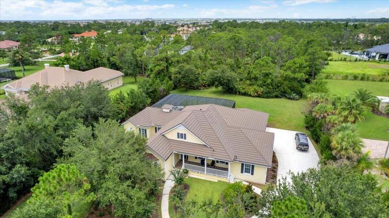 5 bedroom Single Family Residence at 7900 Saddlebrook Drive, PGA Village - Sabal Creek , Port St. Lucie — photo 5