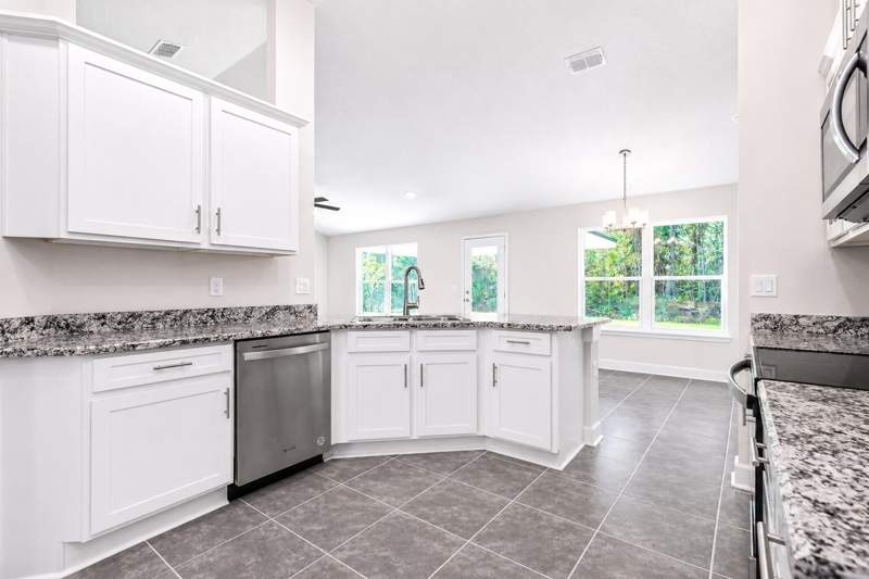 4 bedroom Single Family Residence at 405 NE Airoso Boulevard, Port St Lucie Section 26, Port St. Lucie — photo 2