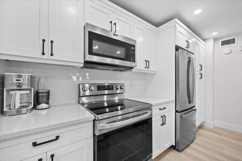 221 Brackenwood Terrace, Palm Beach Gardens FL - photo 9 of 35