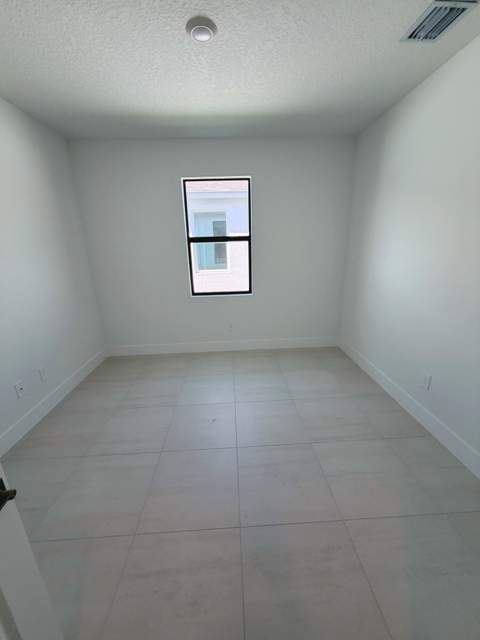 6570 SE Park Trace Drive, Stuart FL - photo 6 of 17