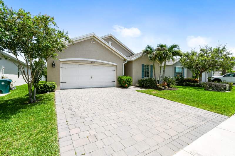 4 bedroom Single Family Residence at 1693 NE White Pine Terrace, OCEAN BREEZE WEST, Jensen Beach — photo 1