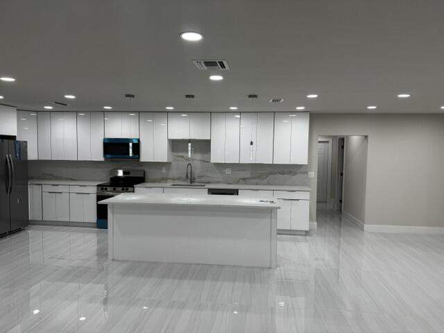 4 bedroom Single Family Residence at 4259 Empress Street, Palm Beach Square Unit 6, Palm Beach Gardens — photo 2