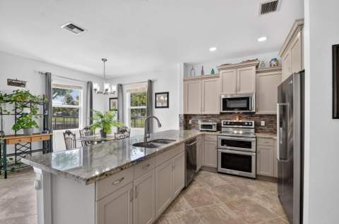 5652 Caranday Palm Drive, Greenacres FL - photo 21 of 54