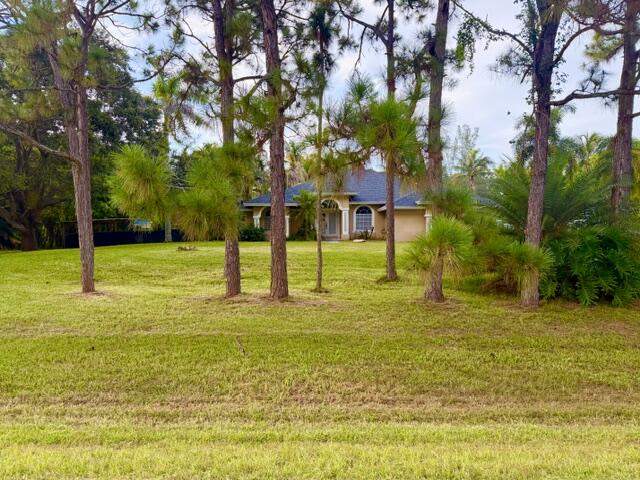 4 bedroom Single Family Residence at 12377 77th Place, Acreage, The Acreage — photo 2