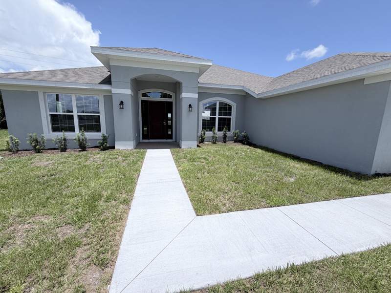4 bedroom Single Family Residence at 5801 NW Dana Circle, Port St Lucie Section 33, Port St. Lucie — photo 2