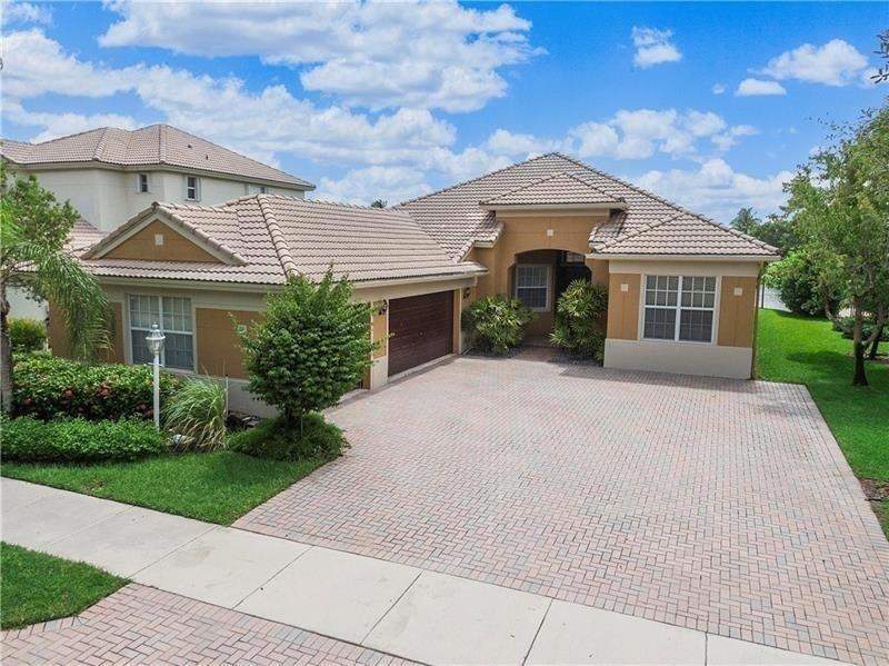 4 bedroom Single Family Residence at 7008 NW 111th Terrace, Parkland Isles, Parkland — photo 3