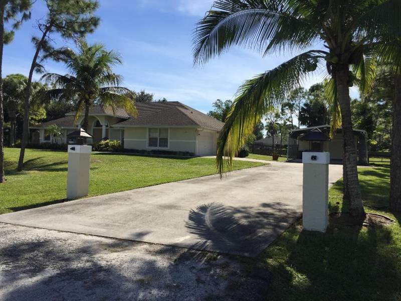 4 bedroom Single Family Residence at 12122 78th Place, West Palm Beach, West Palm Beach — photo 2