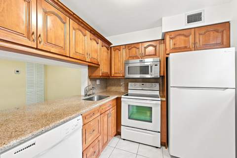 2753 S Oakland Forest Drive #102, Oakland Park FL - photo 12 of 49