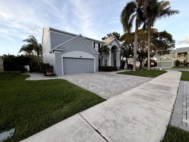 4 bedroom Single Family Residence at 10319 Grove Street, Coopers Grove, Cooper City — photo 2