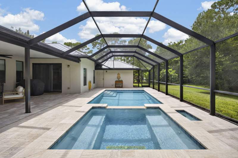4 bedroom Single Family Residence at 17377 W Alan Black Boulevard, The Acreage, The Acreage — photo 5