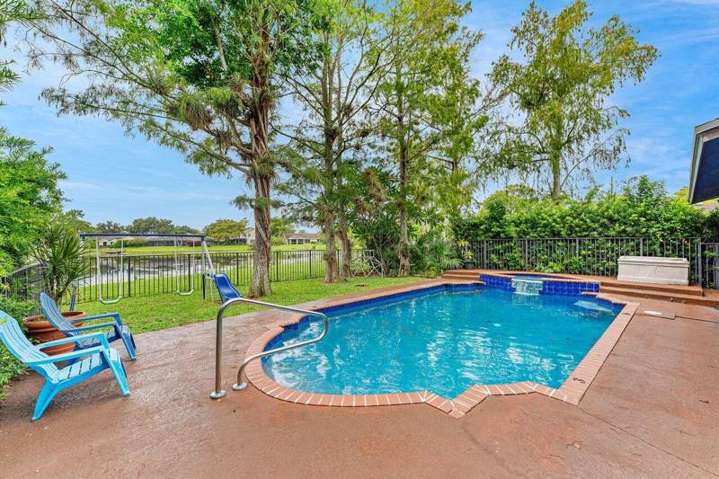 4 bedroom Single Family Residence at 1726 Treehaven Court, Sugar Pond Manor Of Wellington, Wellington — photo 3