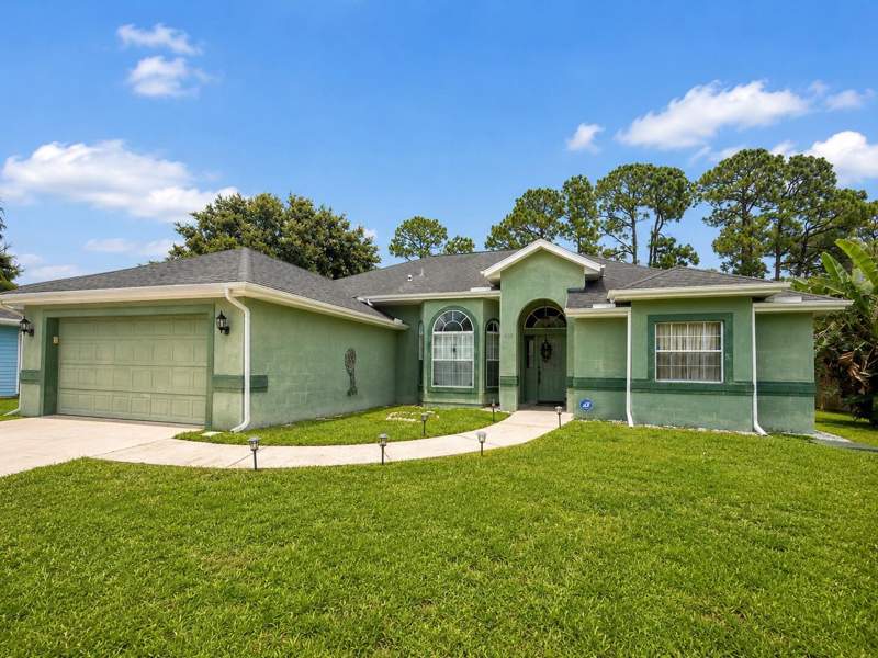 4 bedroom Single Family Residence at 609 SW Jada Road, Port St Lucie Section 21, Port St. Lucie — photo 2