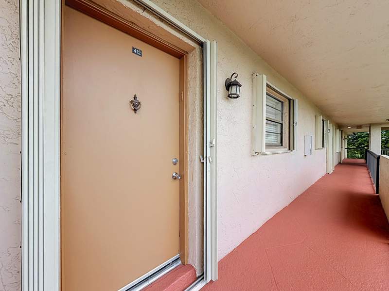2 bedroom Condominium at 4970 E Sabal Palm Boulevard #412, Lakes Of Carriage Hills, Tamarac — photo 5