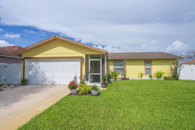 3 bedroom Single Family Residence at 1842 SE Carvalho Street, Port St Lucie Section 13, Port St. Lucie — photo 2
