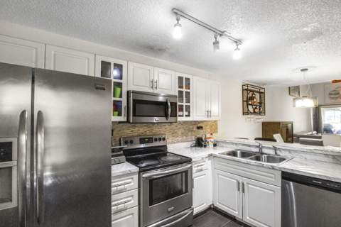 1905 Maplewood Drive, Greenacres FL - photo 8 of 36