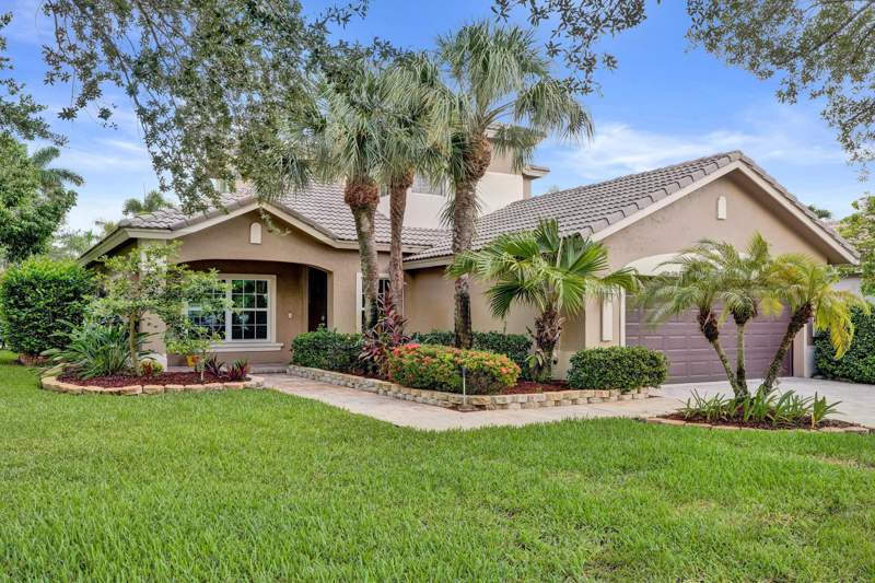 4 bedroom Single Family Residence at 11329 NW 65th Manor, Parkland Isles, Parkland — photo 2