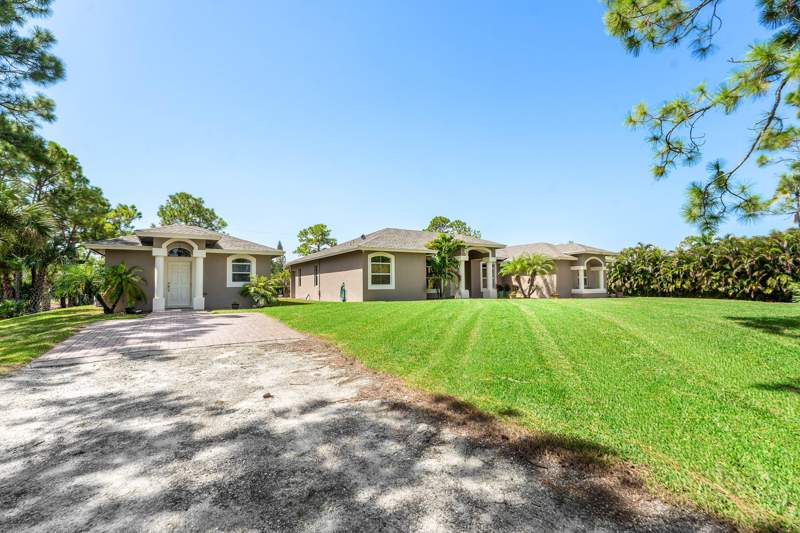 5 bedroom Single Family Residence at 18266 Murcott Boulevard, Acreage, The Acreage — photo 2