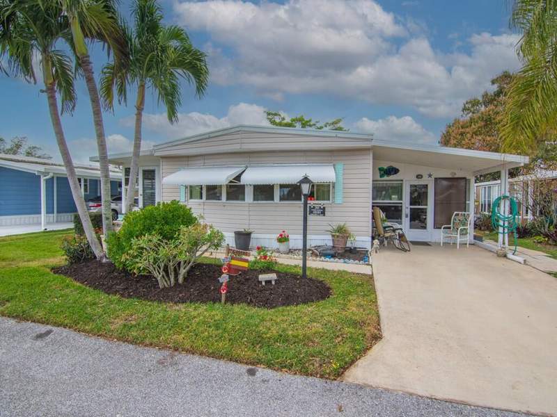 2 bedroom Manufactured Home at 293 NE Moonstone Drive, PINELAKE VILLAGE, Jensen Beach — photo 1