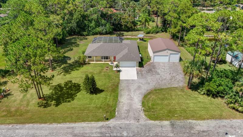 4 bedroom Single Family Residence at 17101 60th Lane, The Acreage, Loxahatchee — photo 2