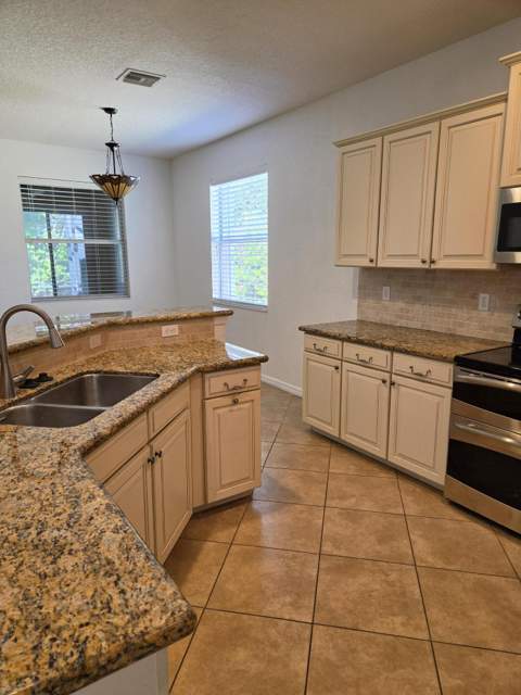 4376 NW Oakbrook Circle, Jensen Beach FL - photo 11 of 45