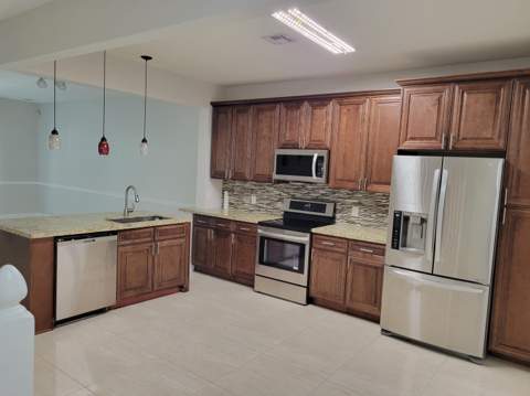 1042 Woodfield Road, Greenacres FL - photo 8 of 39