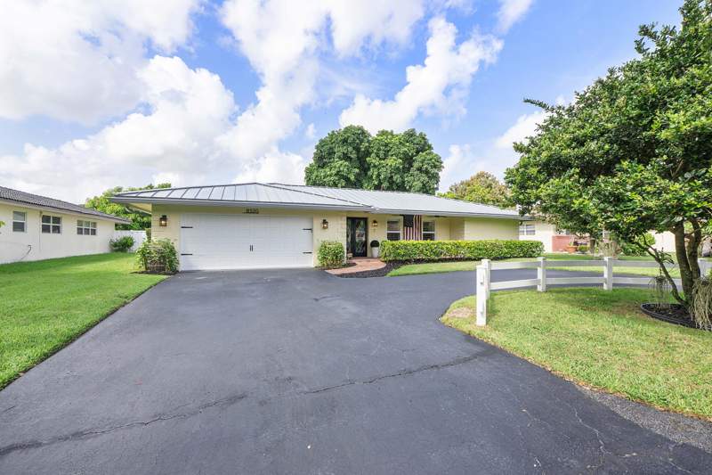 4 bedroom Single Family Residence at 8520 NW 29th Drive, Forest Hills, Coral Springs — photo 2