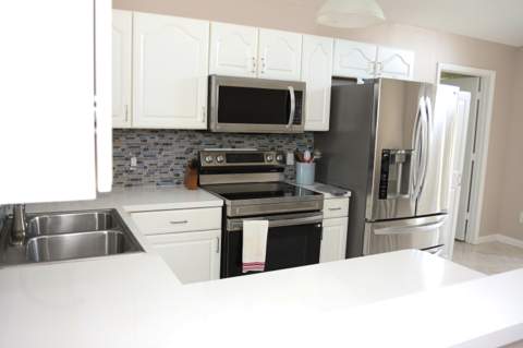 1160 NW Lombardy Drive, Port St. Lucie FL - photo 6 of 42