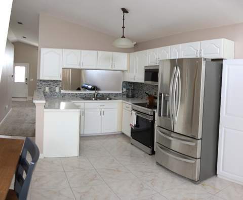 1160 NW Lombardy Drive, Port St. Lucie FL - photo 8 of 42