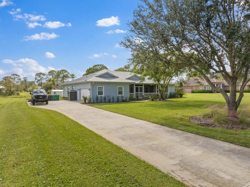 4 bedroom Single Family Residence at 10611 Pine Needle Drive, Pine Hollow Unit Two, Fort Pierce — photo 2