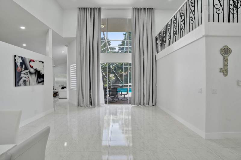 4 bedroom Single Family Residence at 6020 NW 61st Manor, Countrys Point, Parkland — photo 5