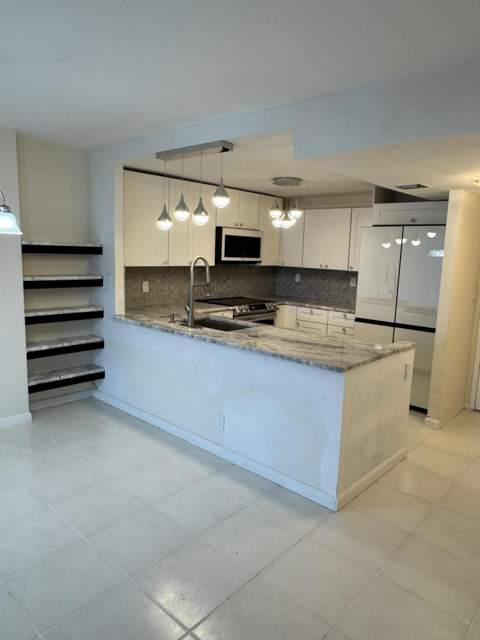 437 Golden Isles Drive #14 j, Hallandale Beach FL - photo 24 of 26