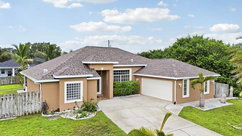 4 bedroom Single Family Residence at 1114 SW Kalevala Drive, Port St Lucie Section 33, Port St. Lucie — photo 2