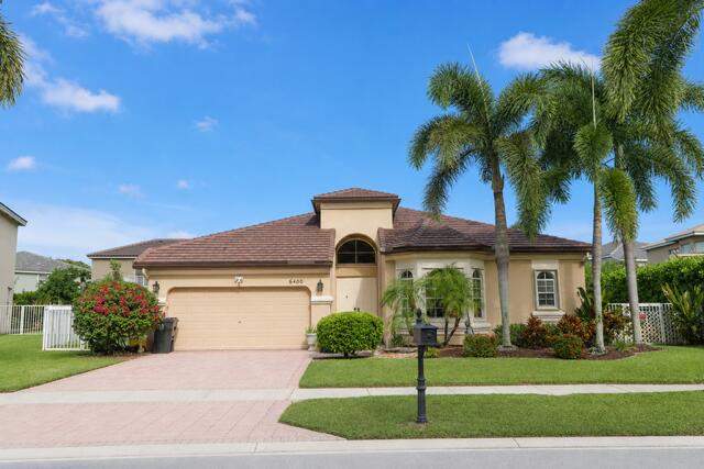 4 bedroom Single Family Residence at 6400 Squirewood Way, Smith Dairy West 7 Ph 2, Lake Worth — photo 2