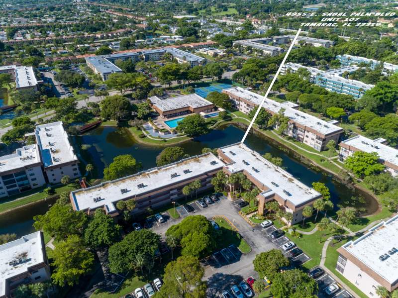2 bedroom Condominium at 4955 E Sabal Palm Boulevard #107, Lakes Of Carriage Hills, Tamarac — photo 2