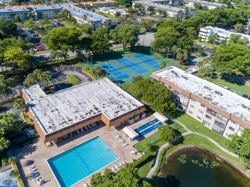 2 bedroom Condominium at 4955 E Sabal Palm Boulevard #107, Lakes Of Carriage Hills, Tamarac — photo 3