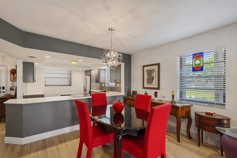 2 bedroom Condominium at 4955 E Sabal Palm Boulevard #107, Lakes Of Carriage Hills, Tamarac — photo 5