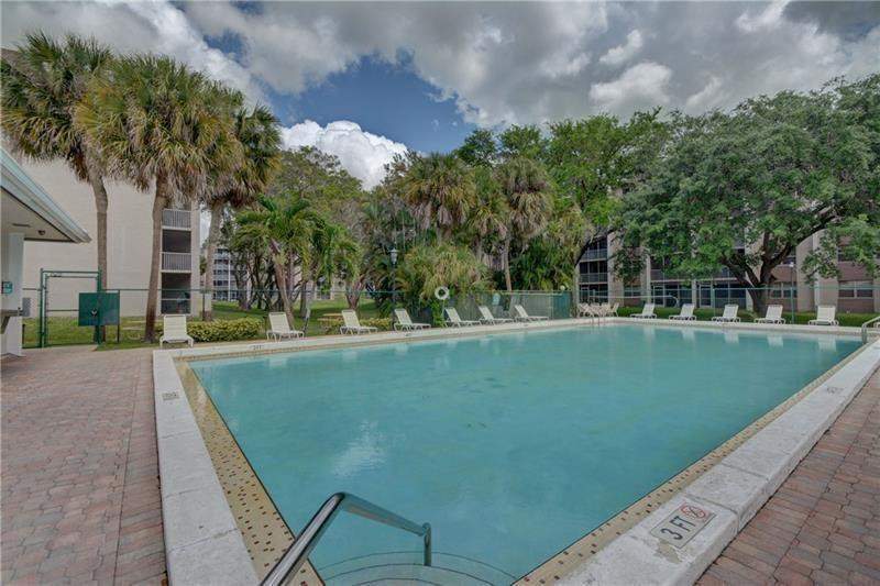 1 bedroom Condominium at 8735 Ramblewood Drive #212, Sherwood Square Condominium, Coral Springs — photo 2