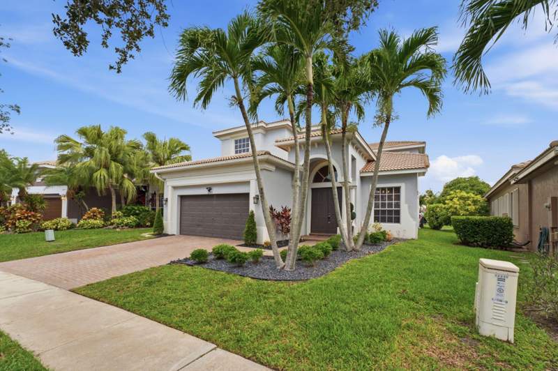 4 bedroom Single Family Residence at 12339 NW 77th Manor, Heron Bay Central, Parkland — photo 2