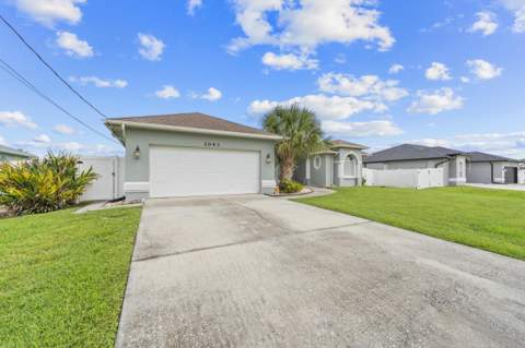 1043 SW Idol Avenue, Port St. Lucie FL - photo 6 of 57