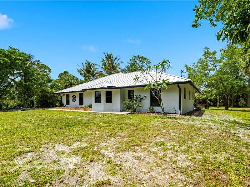 4 bedroom Single Family Residence at 17857 N 82nd Road, The Acreage, The Acreage — photo 4