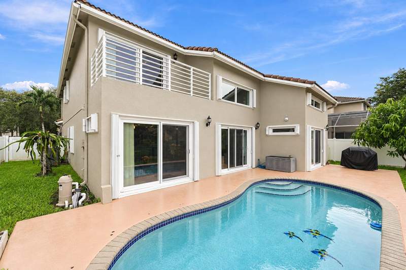 4 bedroom Single Family Residence at 6211 NW 58th Way, Countrys Point, Parkland — photo 2