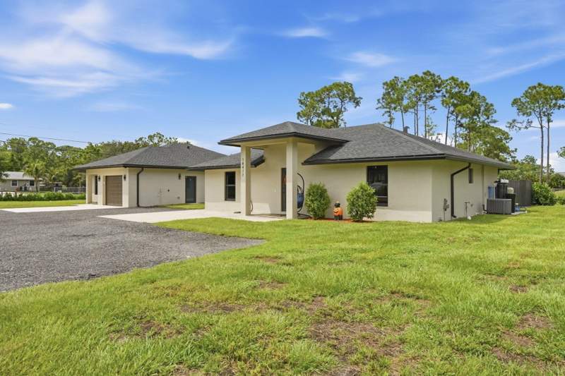 5 bedroom Single Family Residence at 18477 Sycamore Drive, The Acreage, The Acreage — photo 4