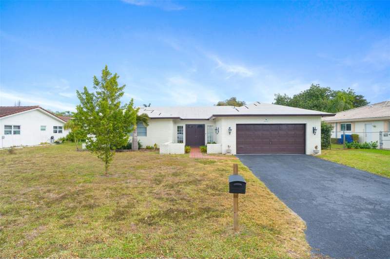 4 bedroom Single Family Residence at 4221 NW 107TH Avenue, CHEVY CHASE AMD PLAT, Coral Springs — photo 2