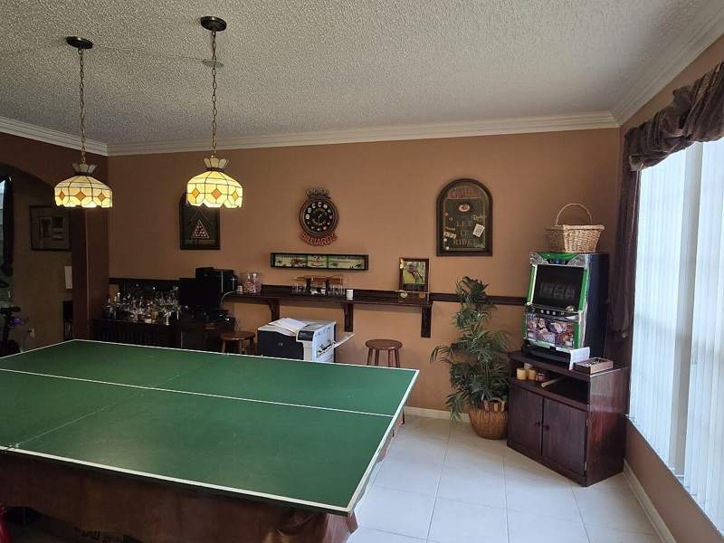 5 bedroom Single Family Residence at 5359 NW 119TH Terrace, WYNDHAM LAKES NORTH, Coral Springs — photo 2