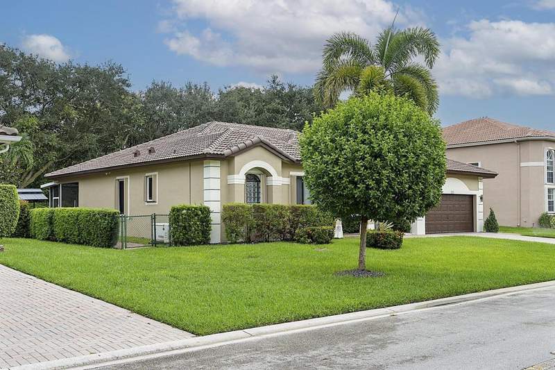 4 bedroom Single Family Residence at 5734 NW 50th Drive, Coral Creek Rep 2, Coral Springs — photo 1