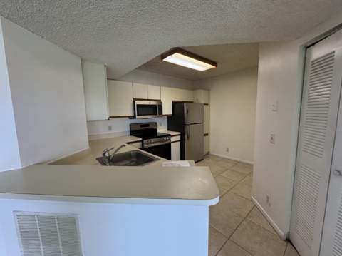 8891 Wiles Road #303, Coral Springs FL - photo 7 of 10