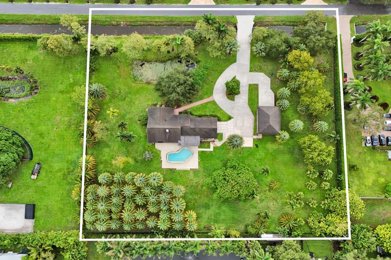 4 bedroom Single Family Residence at 7555 NW 82ND Terrace, Florida Fruit Lands, Parkland — photo 2